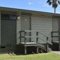Front door next to designated car space